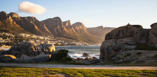 Beautiful sunset view of the Twelve Apostles mountain range and coastline in Cape Town.