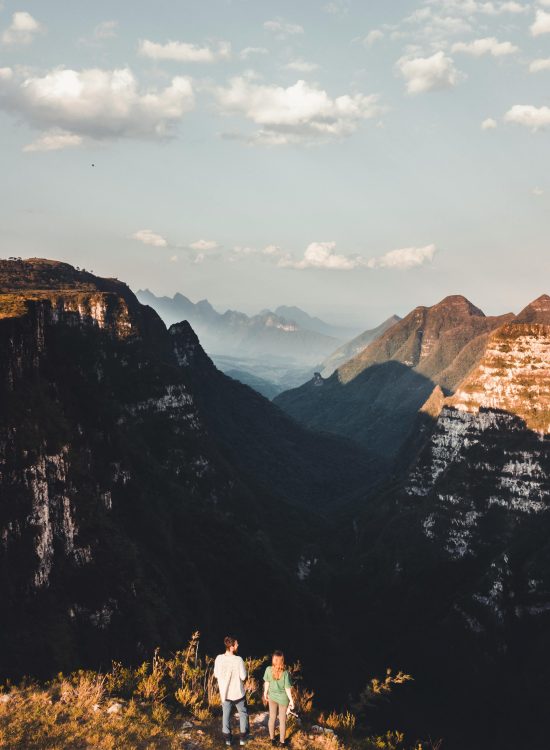 Stunning aerial landscape of Serra Catarinense with two hikers enjoying the view.